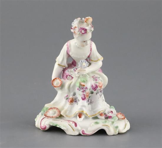 A Derby pale family figure of a seated lady, c.1756, H. 10.5cm